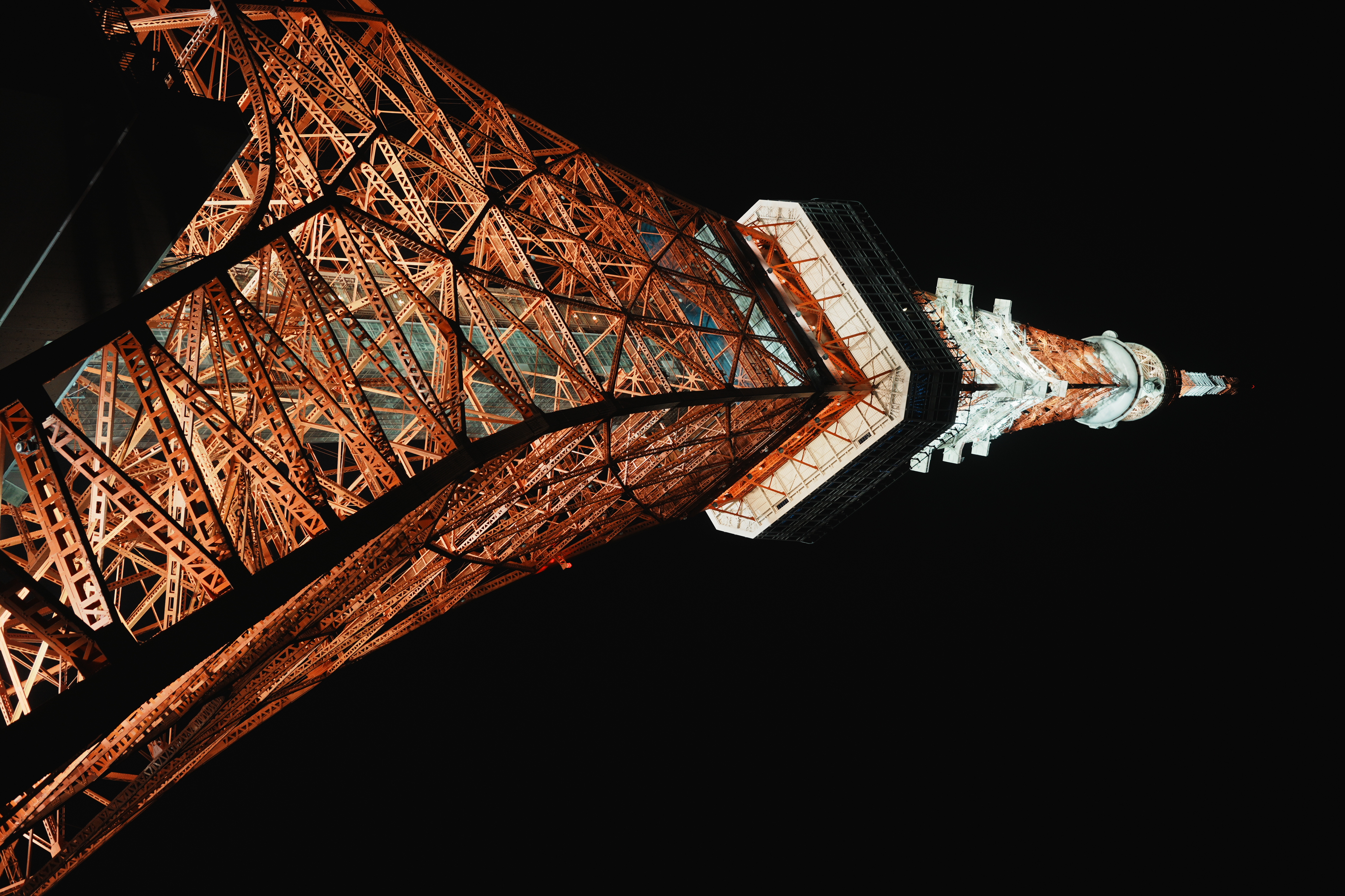 tokyo tower lit at night