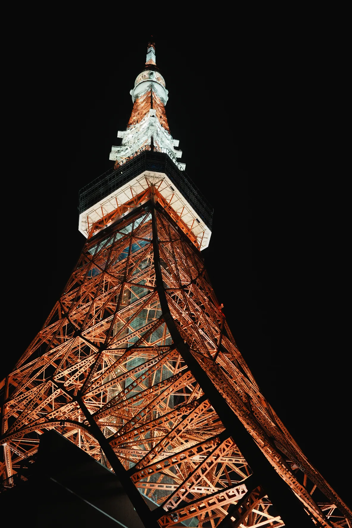 tokyo tower lit at night