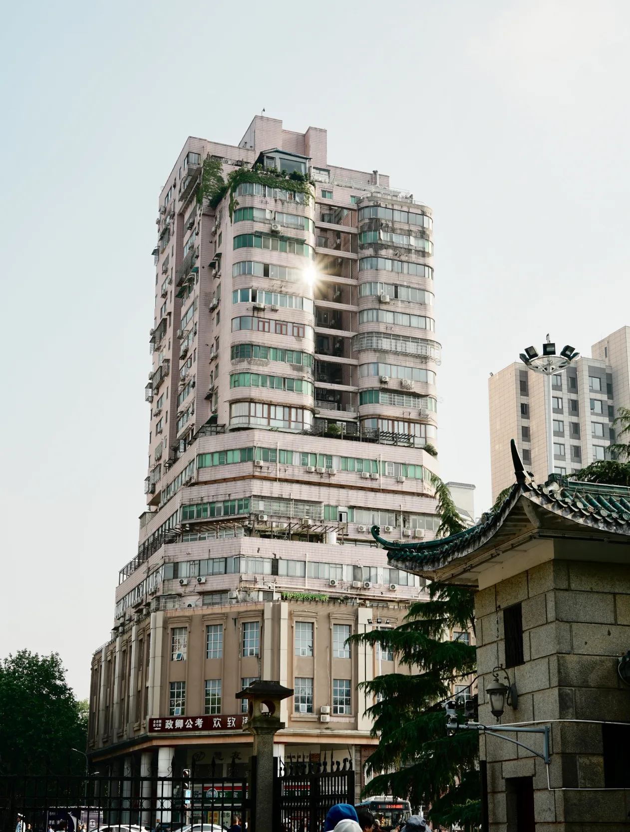 pink building with a sunstar