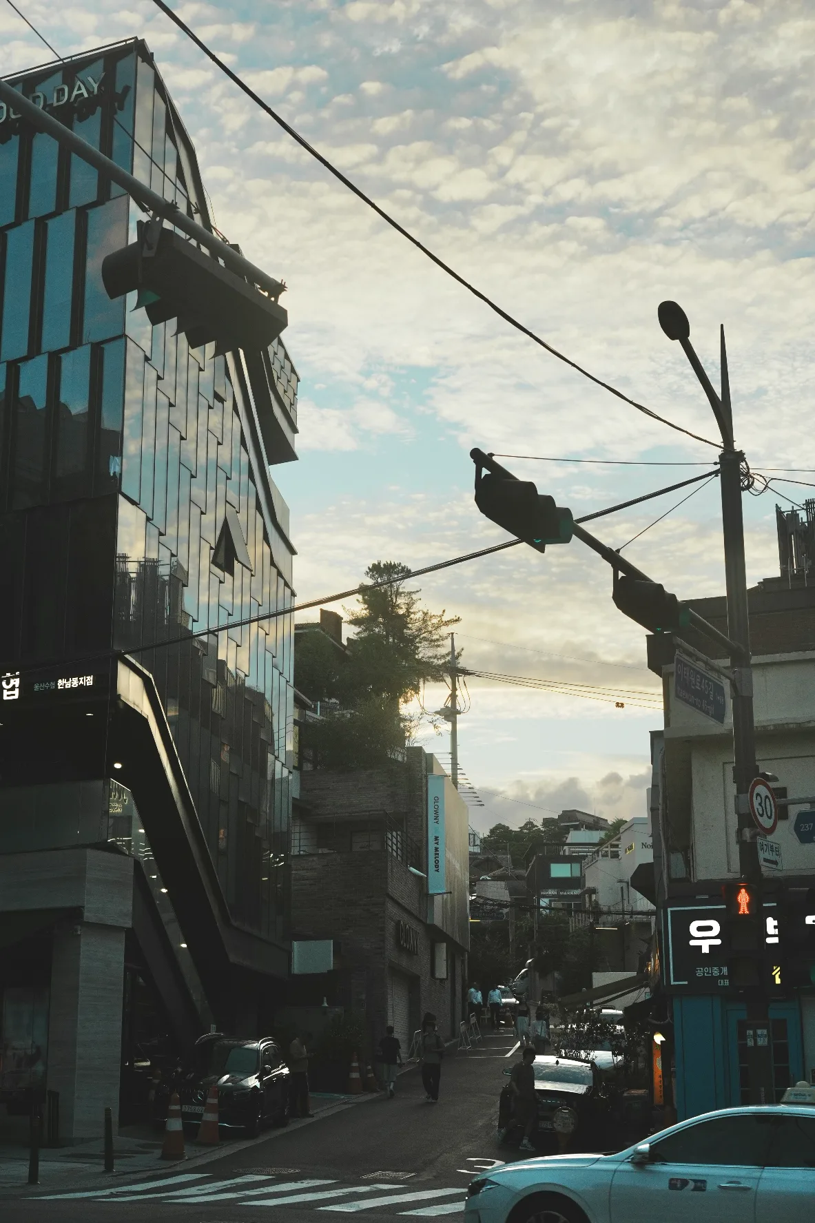 last light over buildings and powerlines