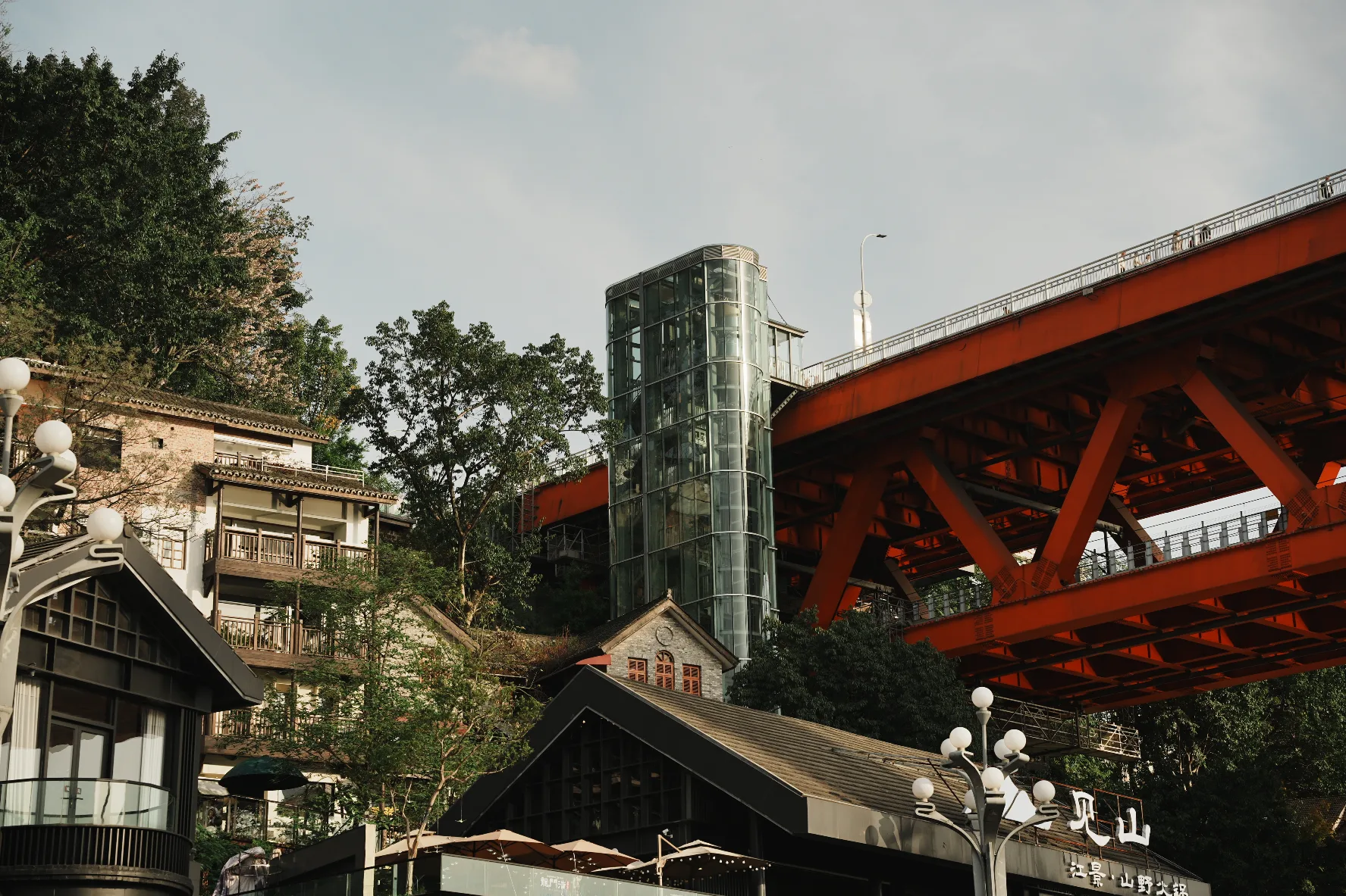 chongqing bridge entry, glass elevator, houses on slope