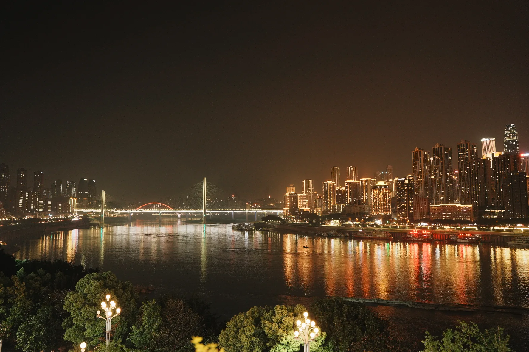 the yangtze river against a cyberpunk chongqing cityscape